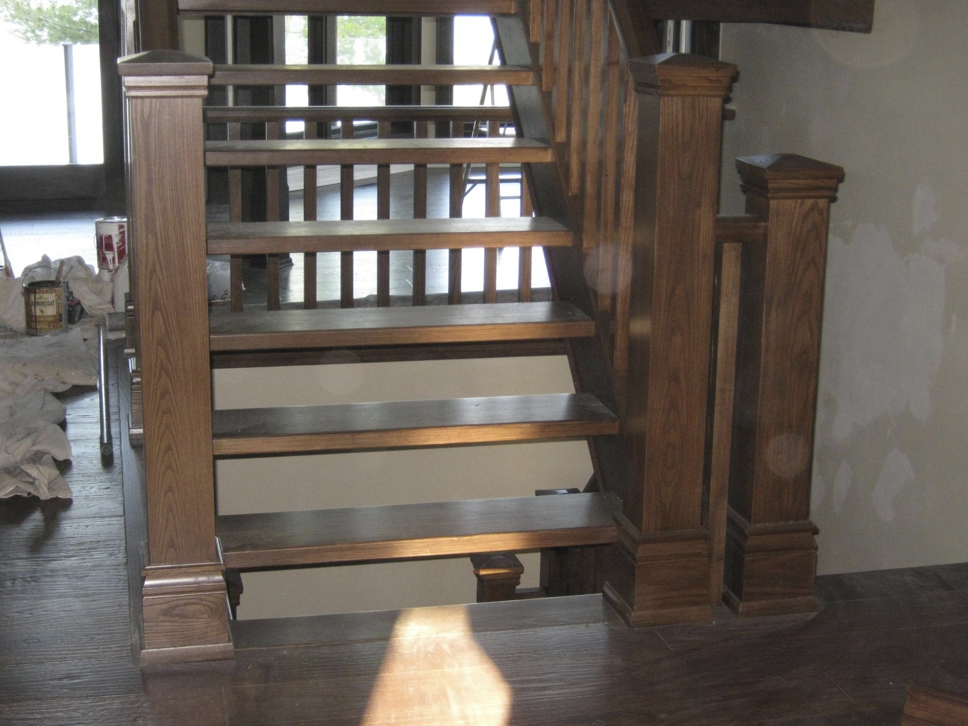 Straight ash Scandinavian style stair with closed stringers