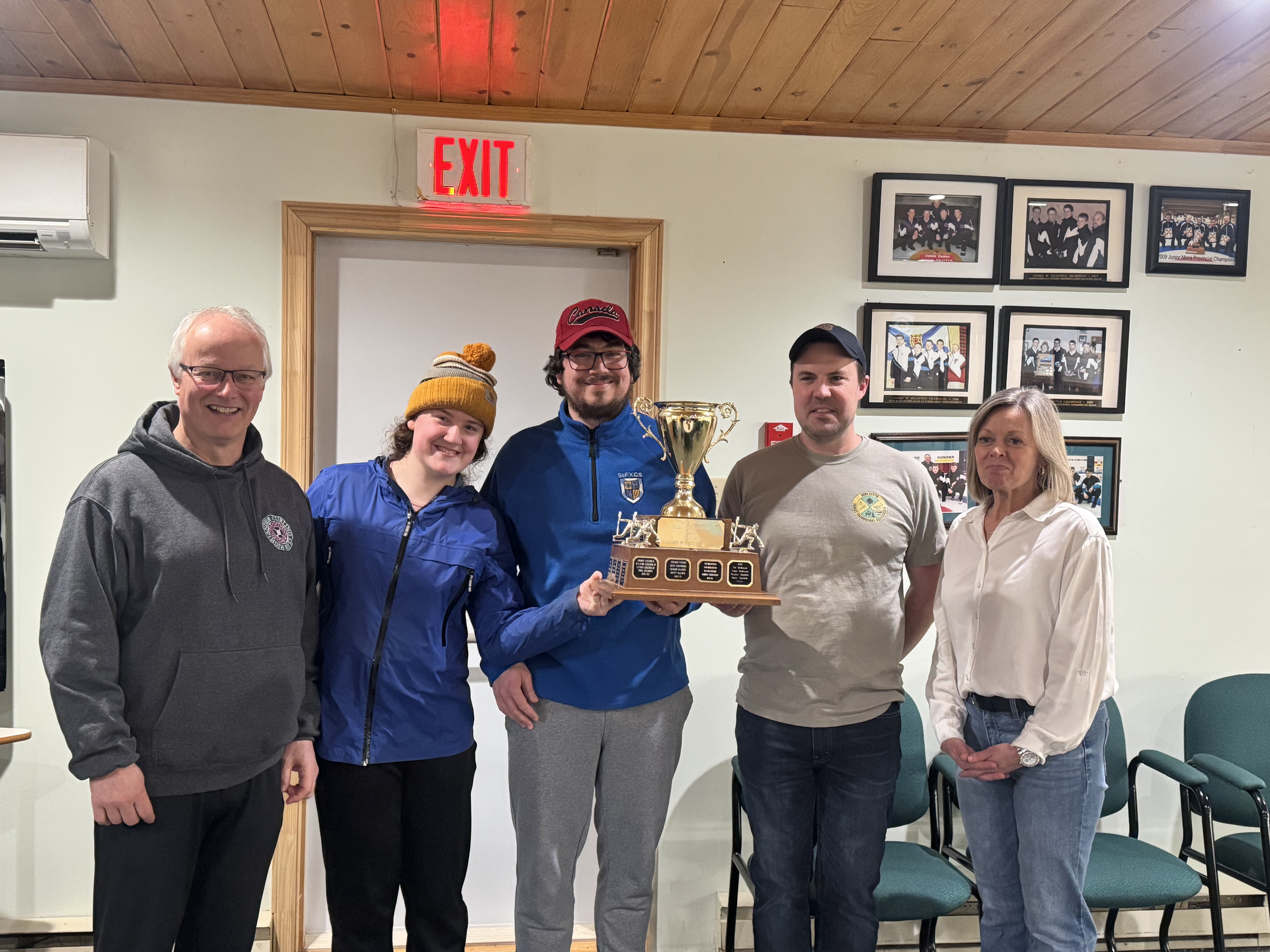 A Division Playoff Champions L-R: Doug Campbell (skip), Maeve Ward (lead), Jean-Alexis Delamer (second), Teddy Stalker (mate). Presented by Rosalie MacGillivray - last year's recipient
