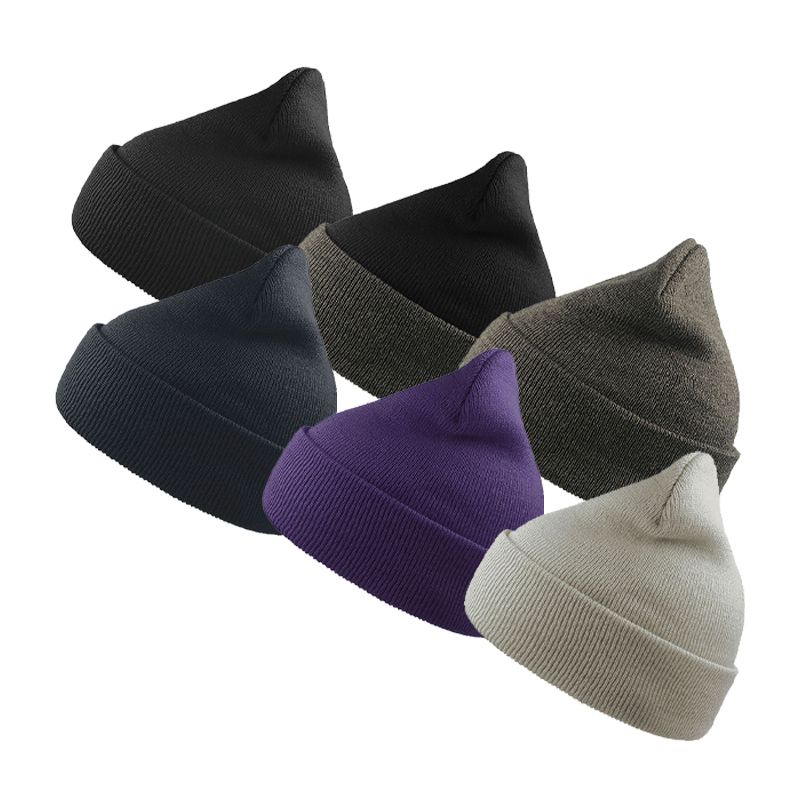 A couple of people standing in front of a store