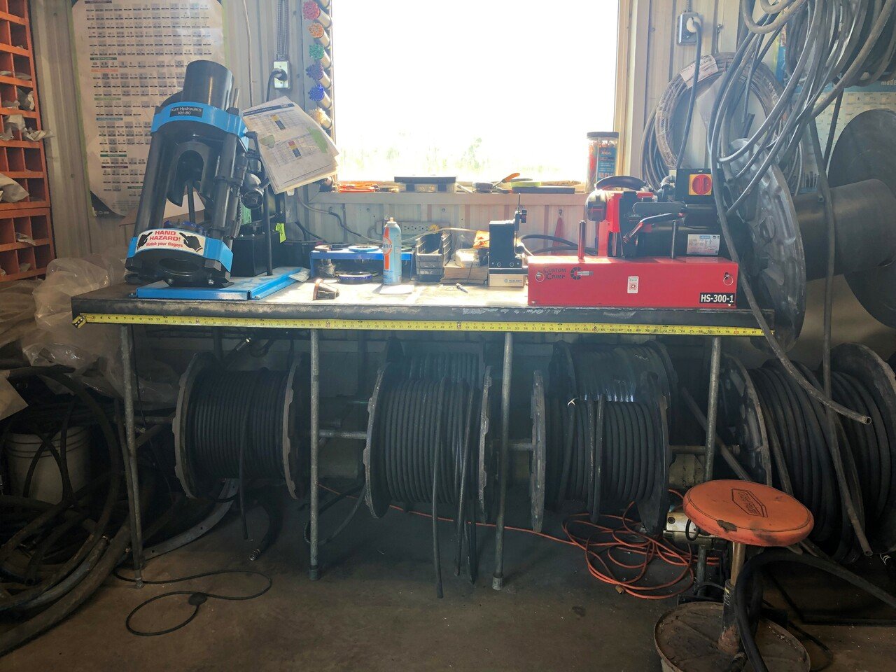 Work station to measure, cut and crimp all your hydraulic hose requirements. 