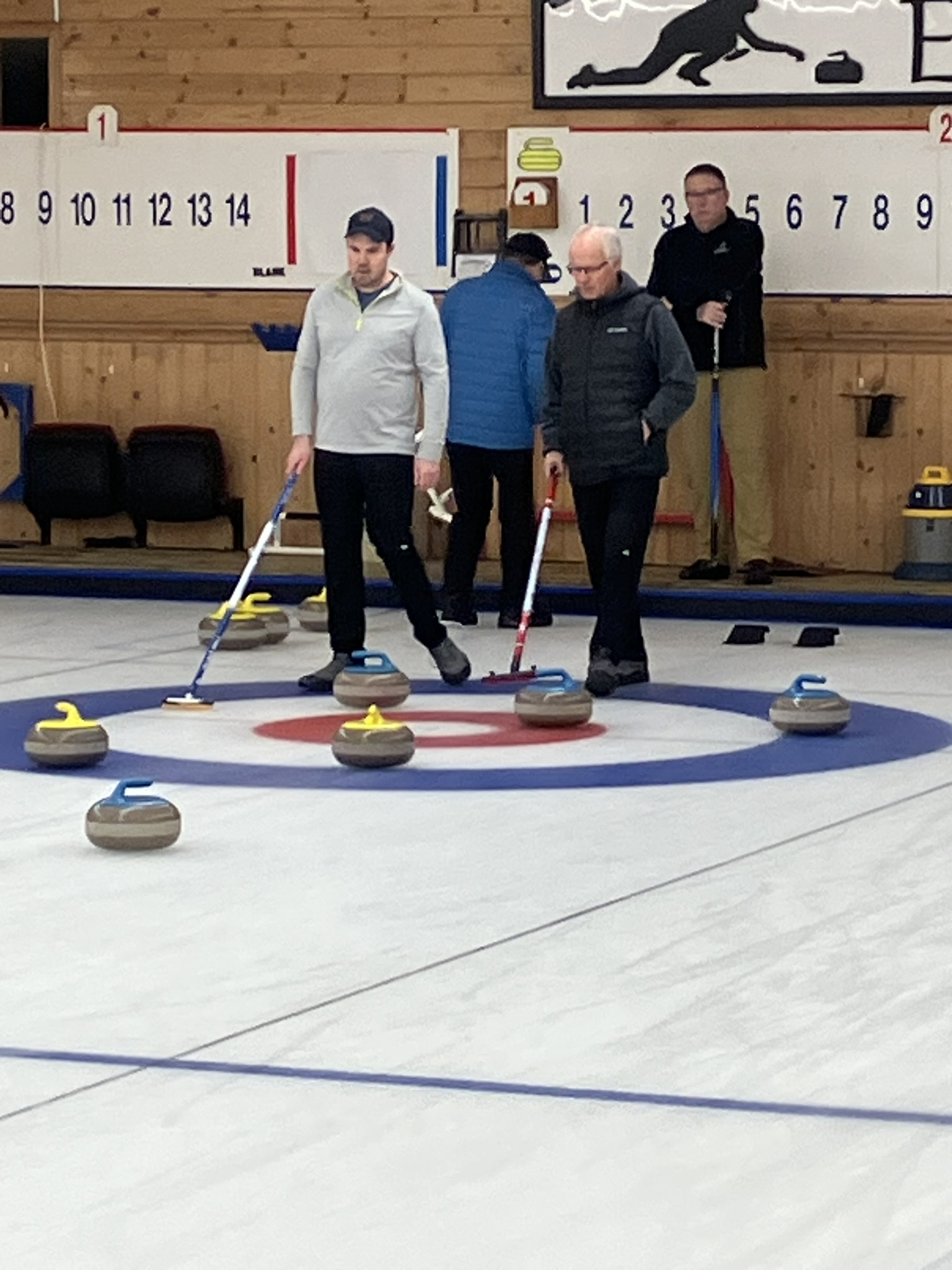 Doug and Teddy deliberating their shot