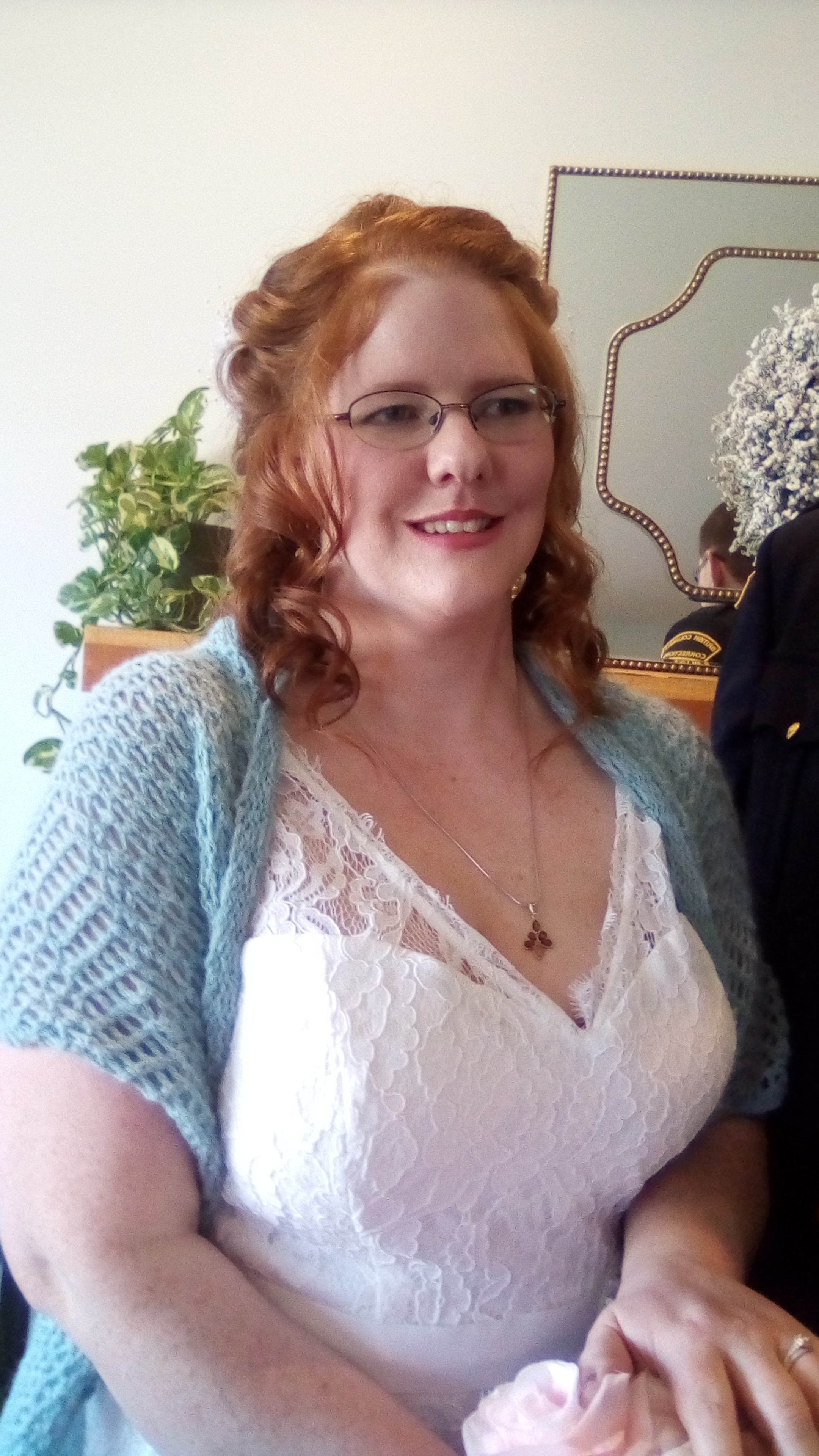 Debra knit her daughter a beautiful "something blue" wedding shawl.