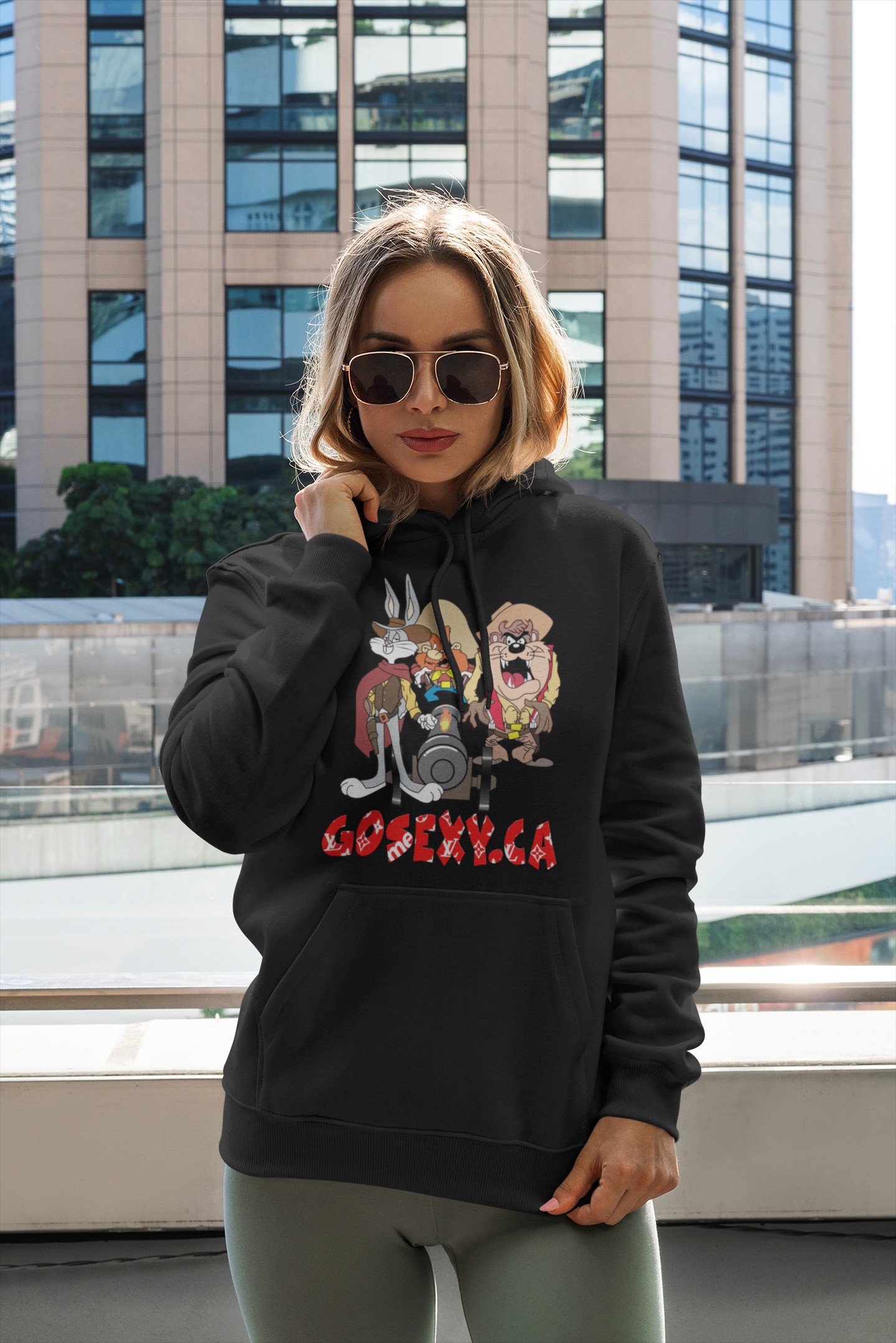 https://0901.nccdn.net/4_2/000/000/071/260/a-woman-with-a-pullover-hoodie-posing-by-a-tall-building-gosexyc.png