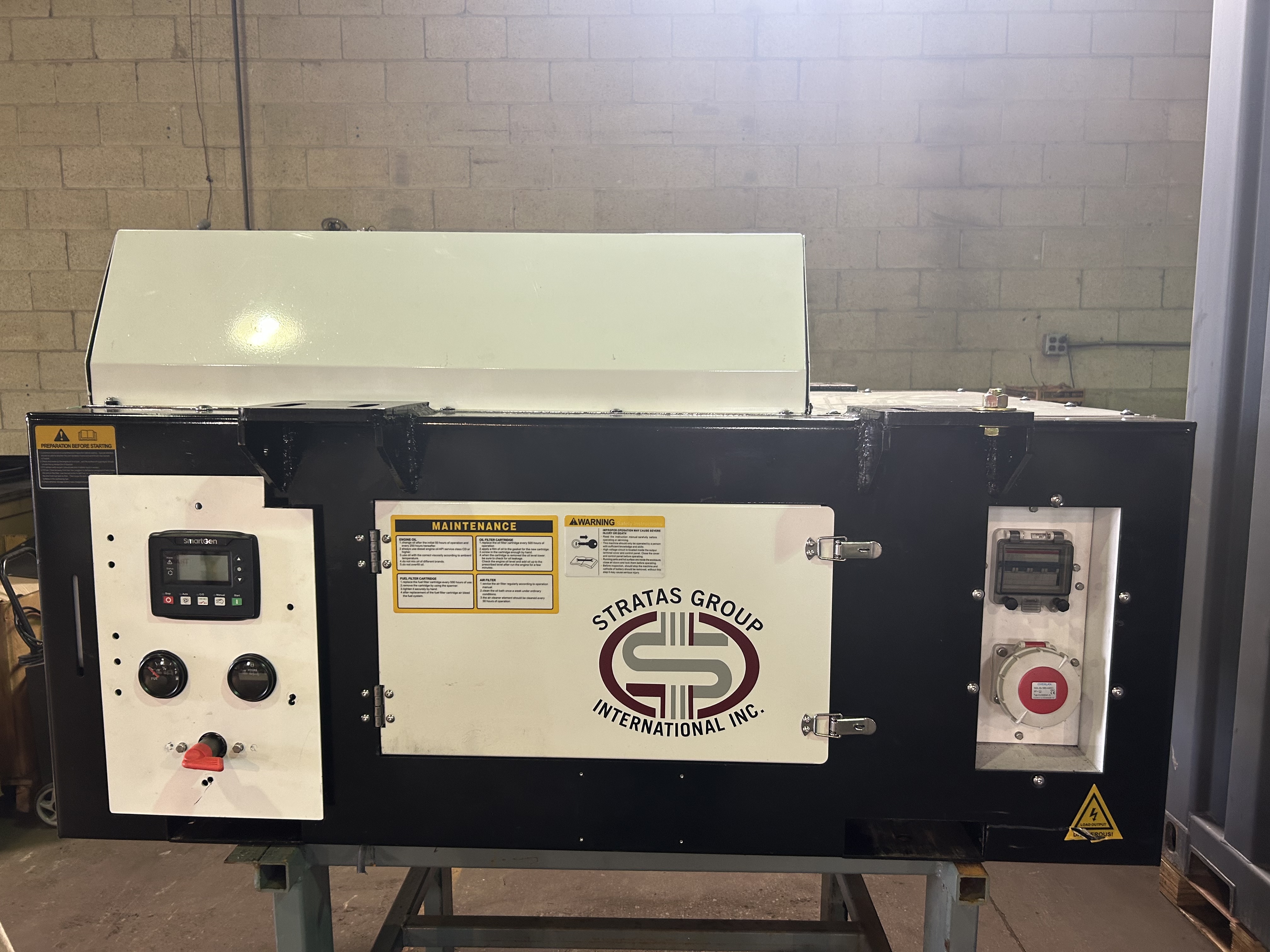 Warehouse interior with rows of stacked tires and an orange semi-truck on a clean, polished floor.