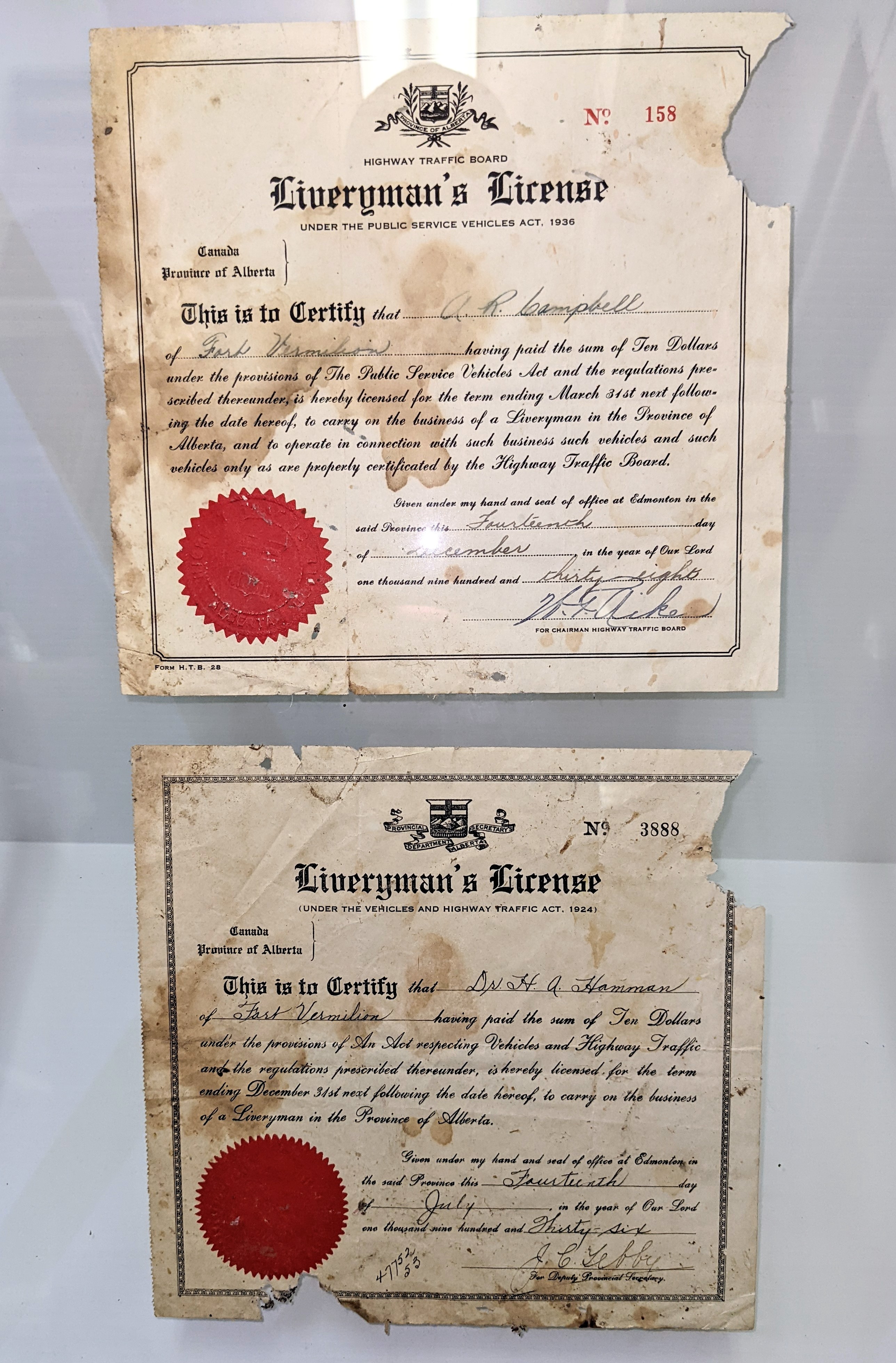 These Liveryman Licenses are granted to A.R. Campbell (issued 1938) and Dr. G.A Hamman (issued 1936). Liverymen could rent animals and agriculture implements, host auctions, organize “bus” tours and deliver milk and wood. This license also applied to operating motor vehicles and is considered an early drivers license. One could be fined up to $100 or 6 months in jail for providing chauffeur services without a license. In the 30's Alex Campbell converted a truck into a snow machine which Dr. Hamman used to transport patients and provide easier access to remote cases - a leap forward from snowshoeing or Dog sledding in the cold winter. These licenses likely were acquired for the operation of said snow machine!
993.2.1 / Fort Vermilion Heritage Centre
23/08/2022