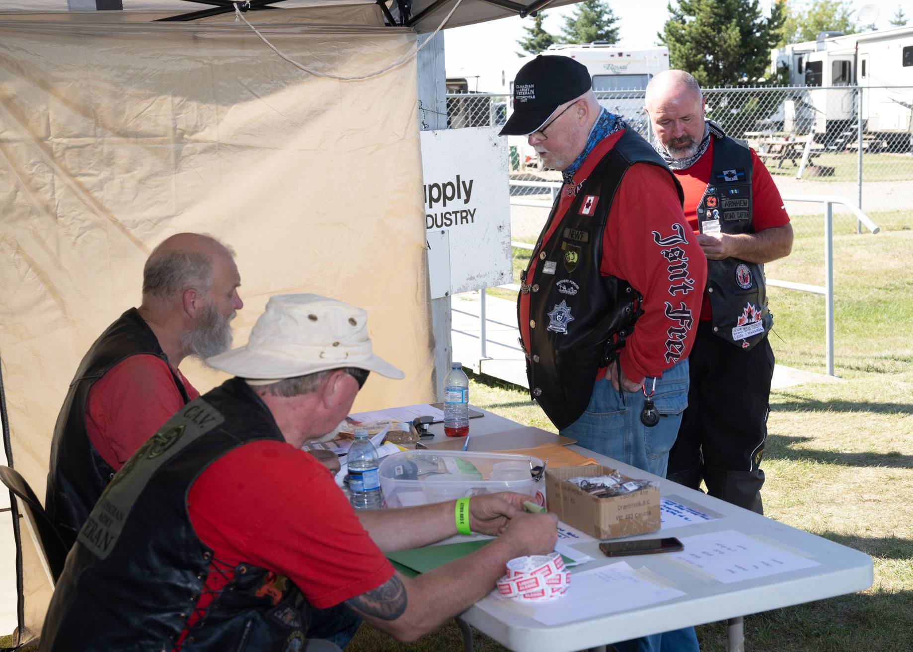 https://0901.nccdn.net/4_2/000/000/071/260/registration-table.jpg