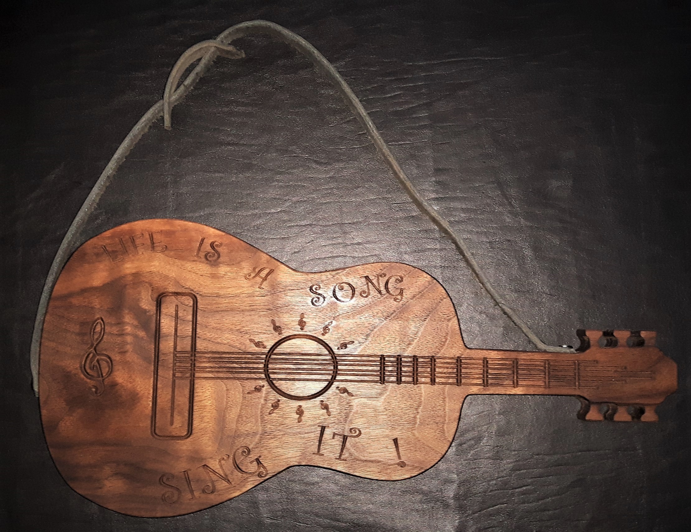 Cutting board, guitar, carved,  Campbell river BC, Vancouver island BC, Vancouver BC, Victoria BC, British Columbia,Alberta