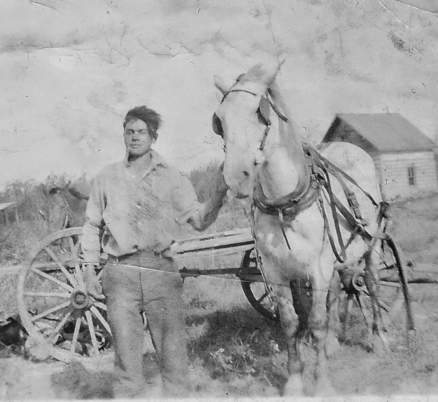 This gentleman seems to be battling the same strong winds we have today! The picture isn't great - but if you do recognize him please let us know!
2019.24.48 / Lizotte, Maria