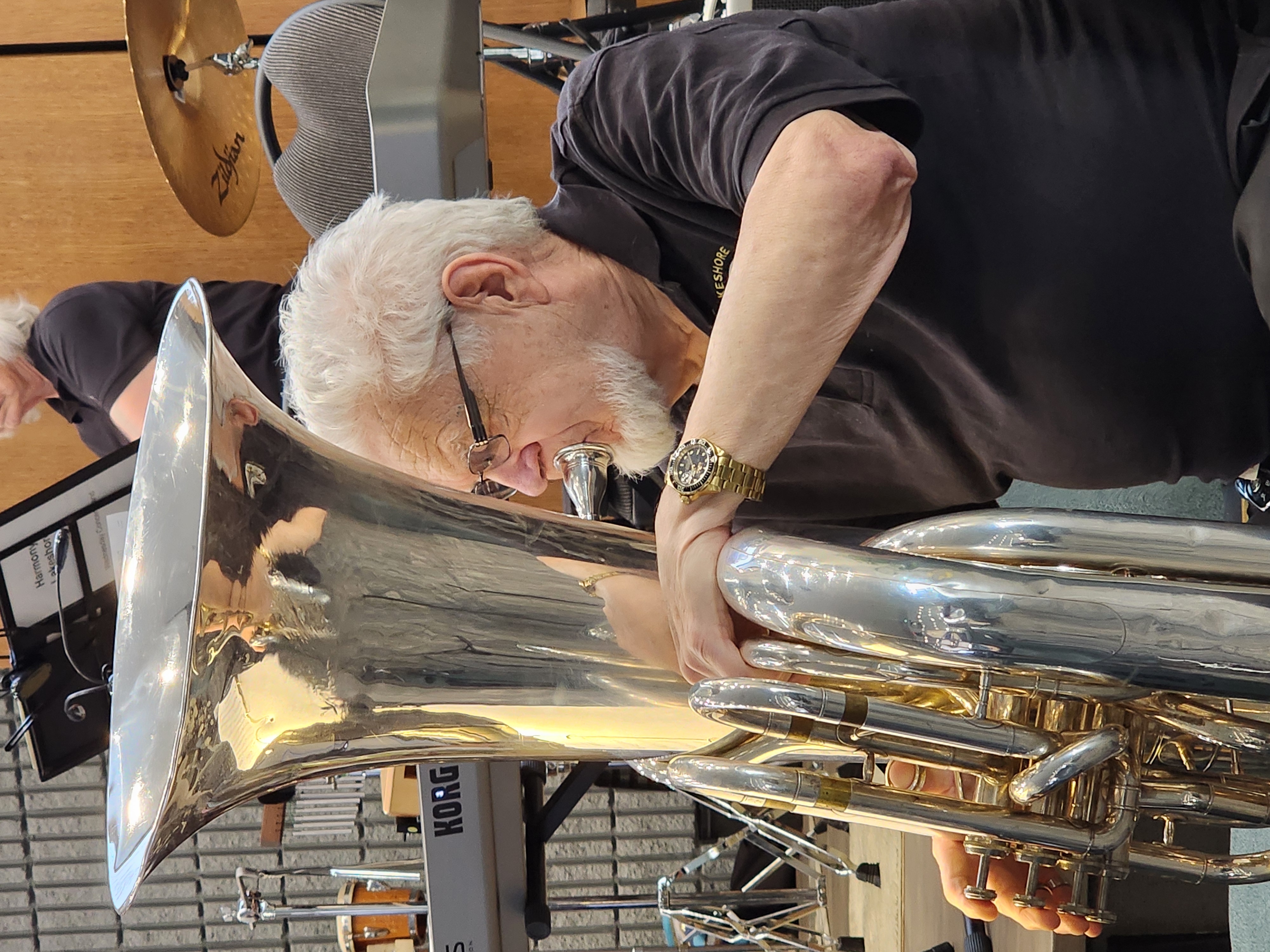 3 members of the low brass section Lakeshore New Horizons Band at the FBC Baptist church Cobourg Ontario April 2025.