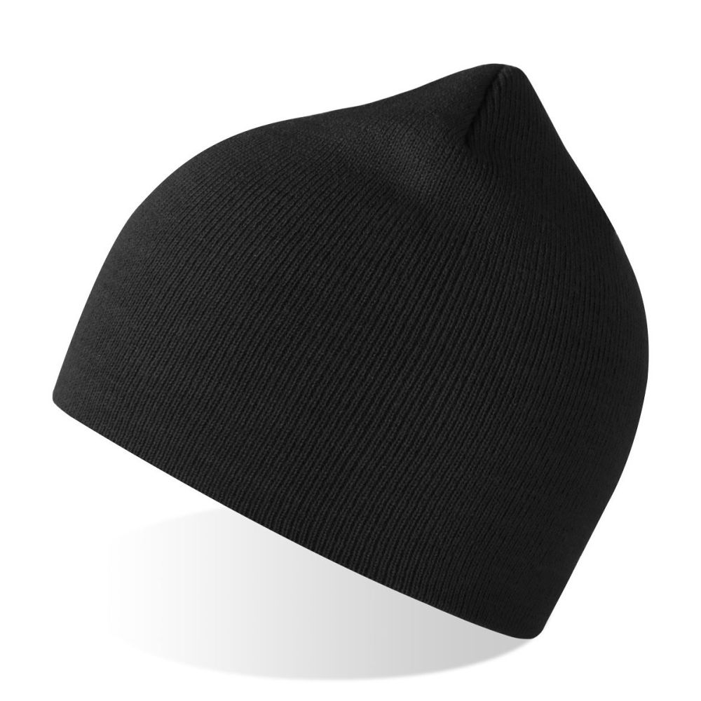 a hat sitting on top of a table next to a vase