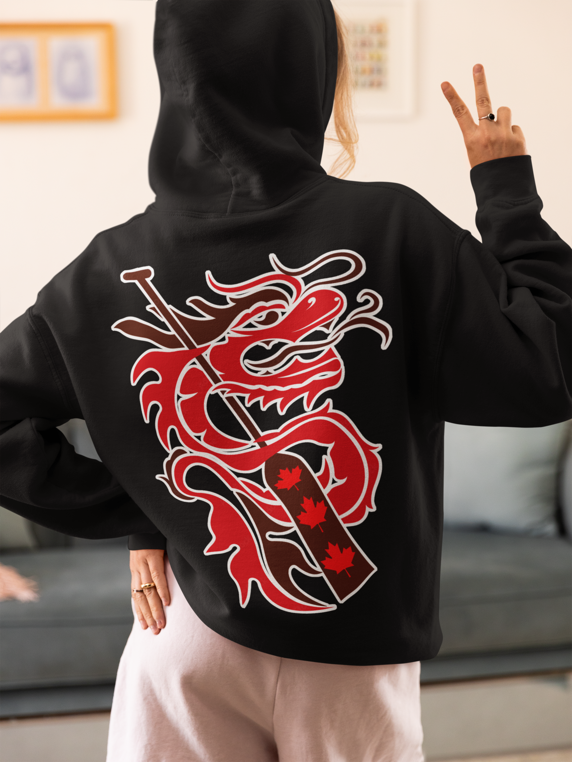 https://0901.nccdn.net/4_2/000/000/076/de9/back-view-hoodie-of-a-woman-in-a-cozy-outfit-making-a-peace-sign.png