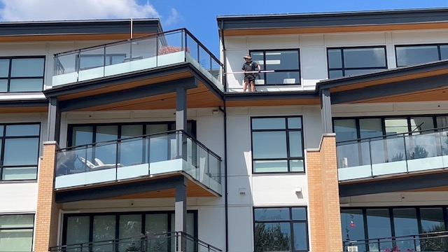 brush washing balcony railings