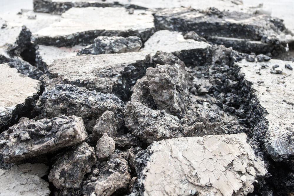 Large chunks of excavated road that will be recycled