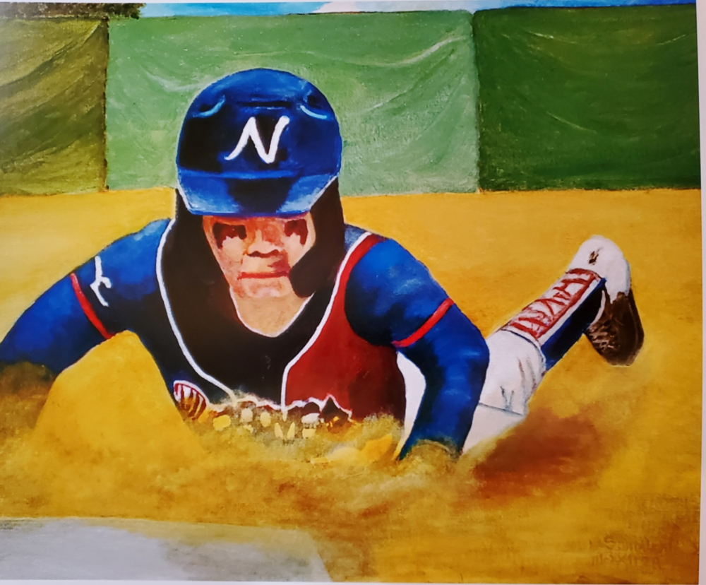 Boy sliding into home