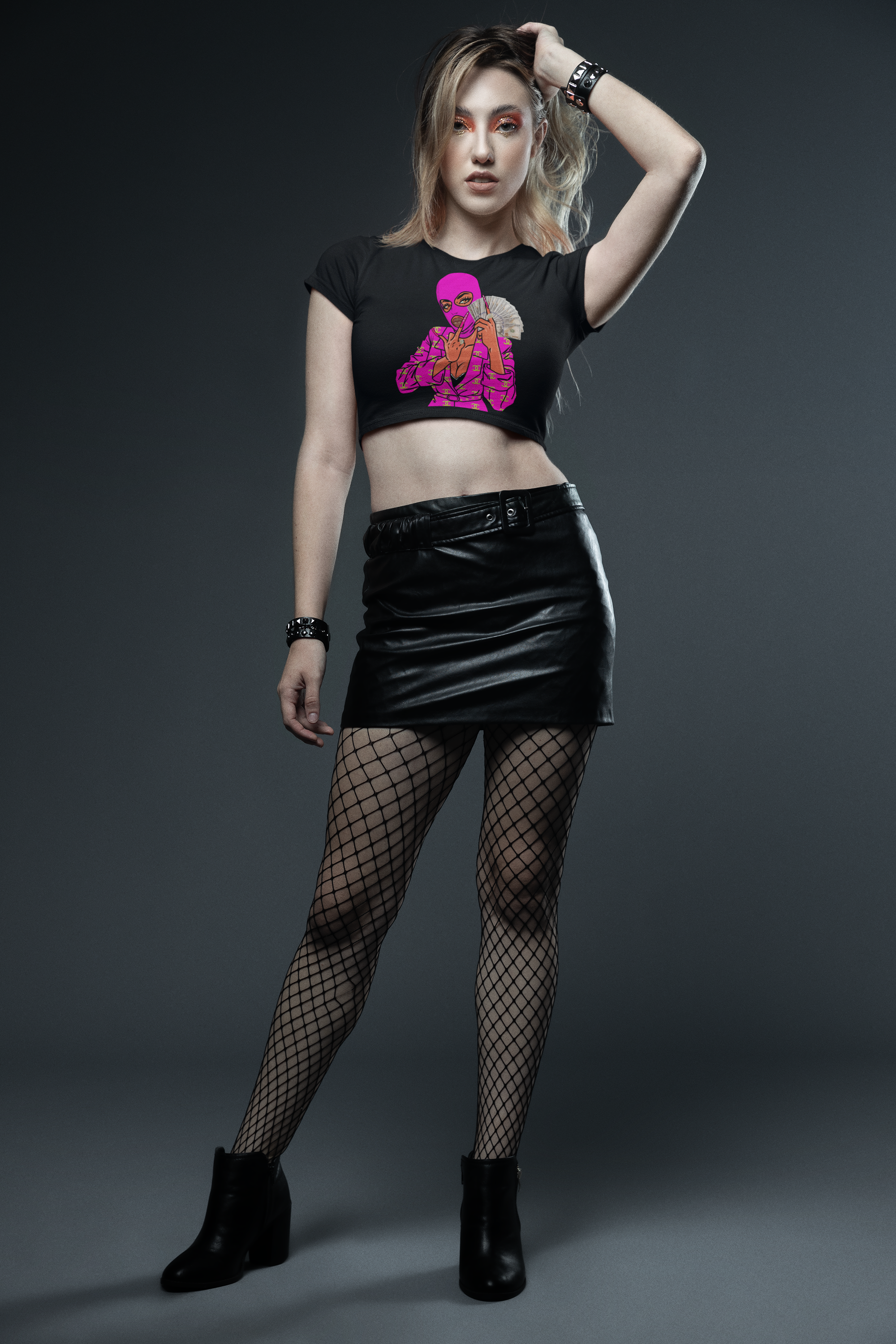 https://0901.nccdn.net/4_2/000/000/079/c81/bella-canvas-crop-top-featuring-a-woman-with-a-glam-rock-style-g.png