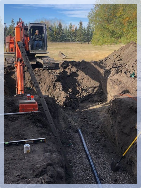 Tractor digging into dirt