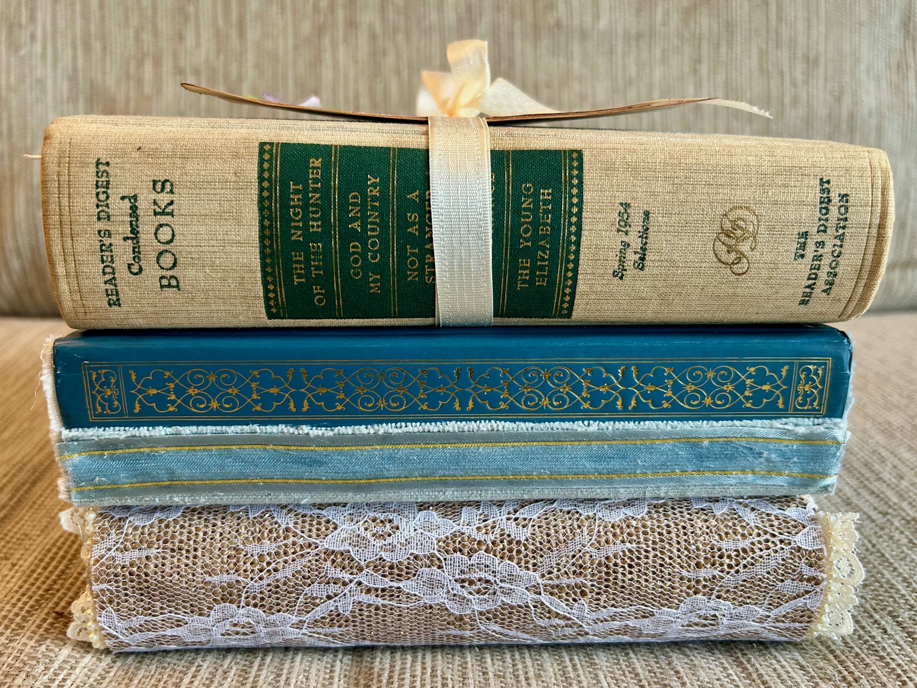A pretty stack of repurposed and lovingly decorated 'Journey Journals' just waiting for their new home!