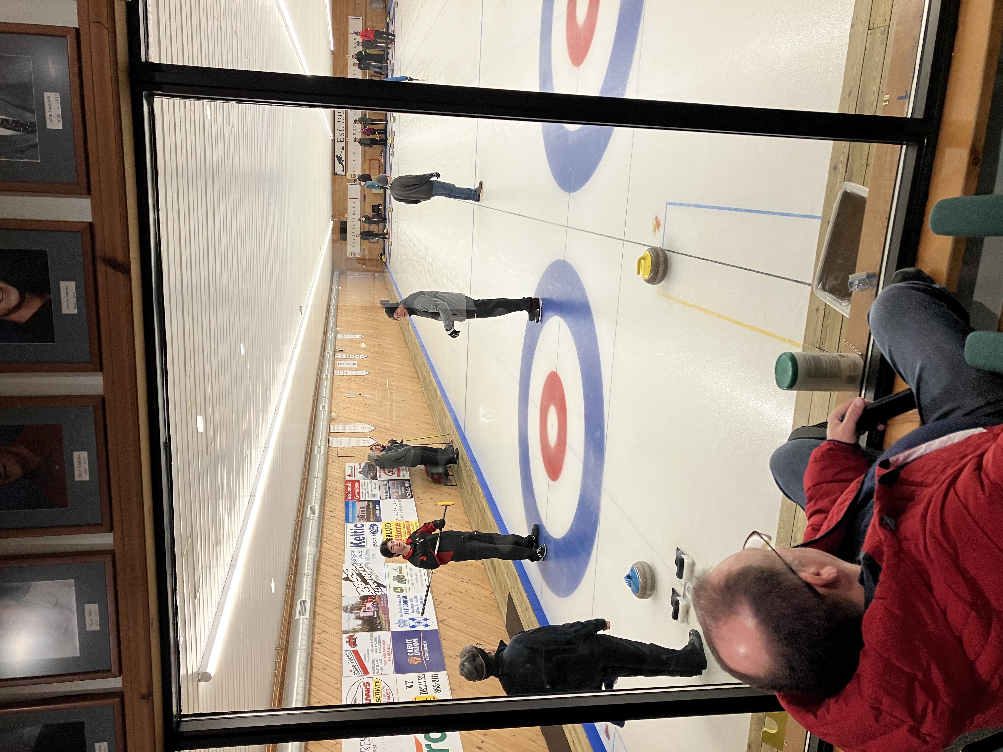 Jim Marlow, the Club Icemaker, takes in the action