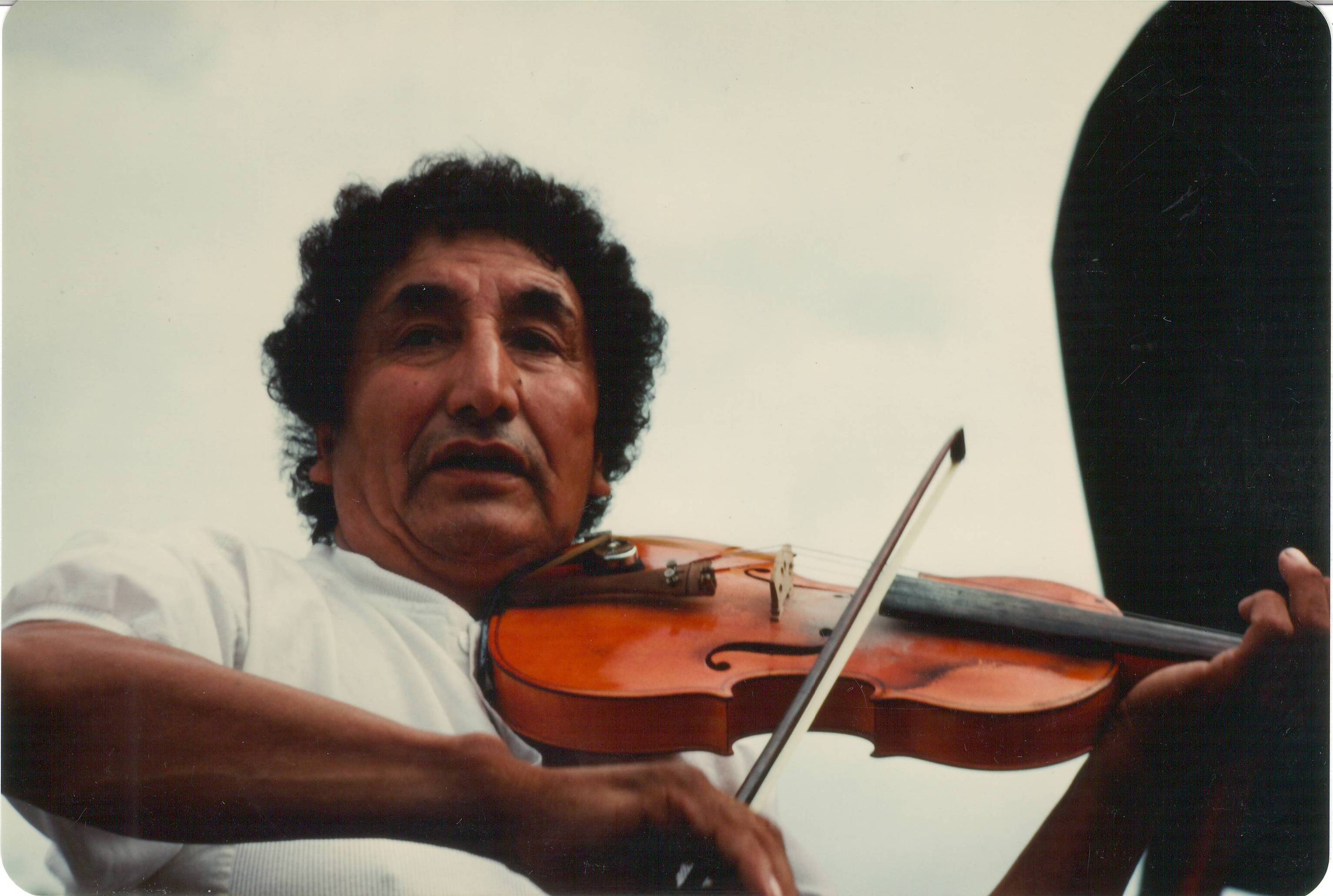 Does anyone recognize this fiddle player from the 1988 Bicentennial Celebrations? He was playing fiddle for the "Fort toe Tappers" a square dancing group that performed on a float in the parade and again later on stage at homecoming.
990.4.29.182 / Fort Vermilion & District Bicentennial Association
--EDIT--
This is William Cardinal, also known as "Teabags".