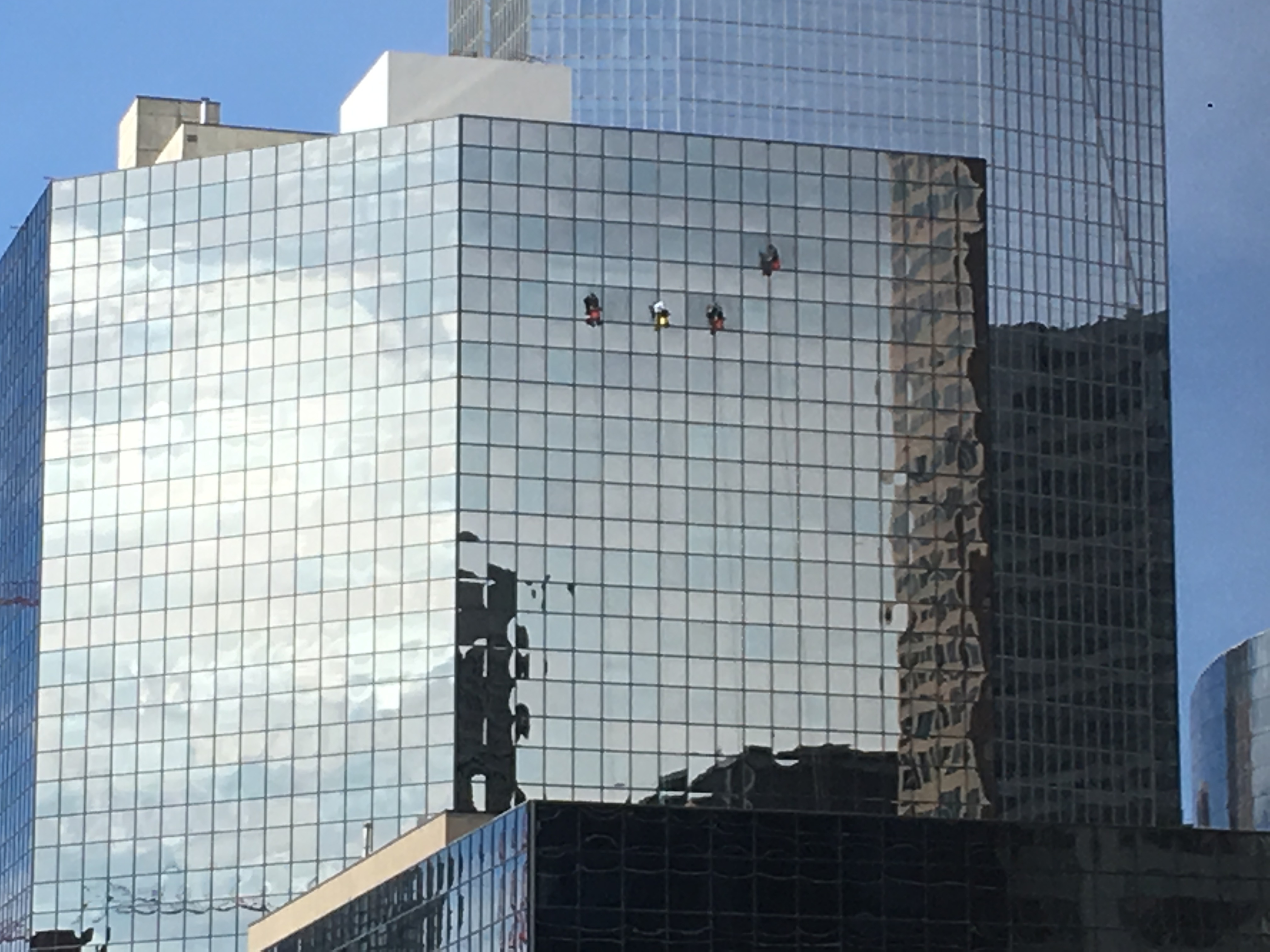 Gulf Canada Square window cleaning by rope chair