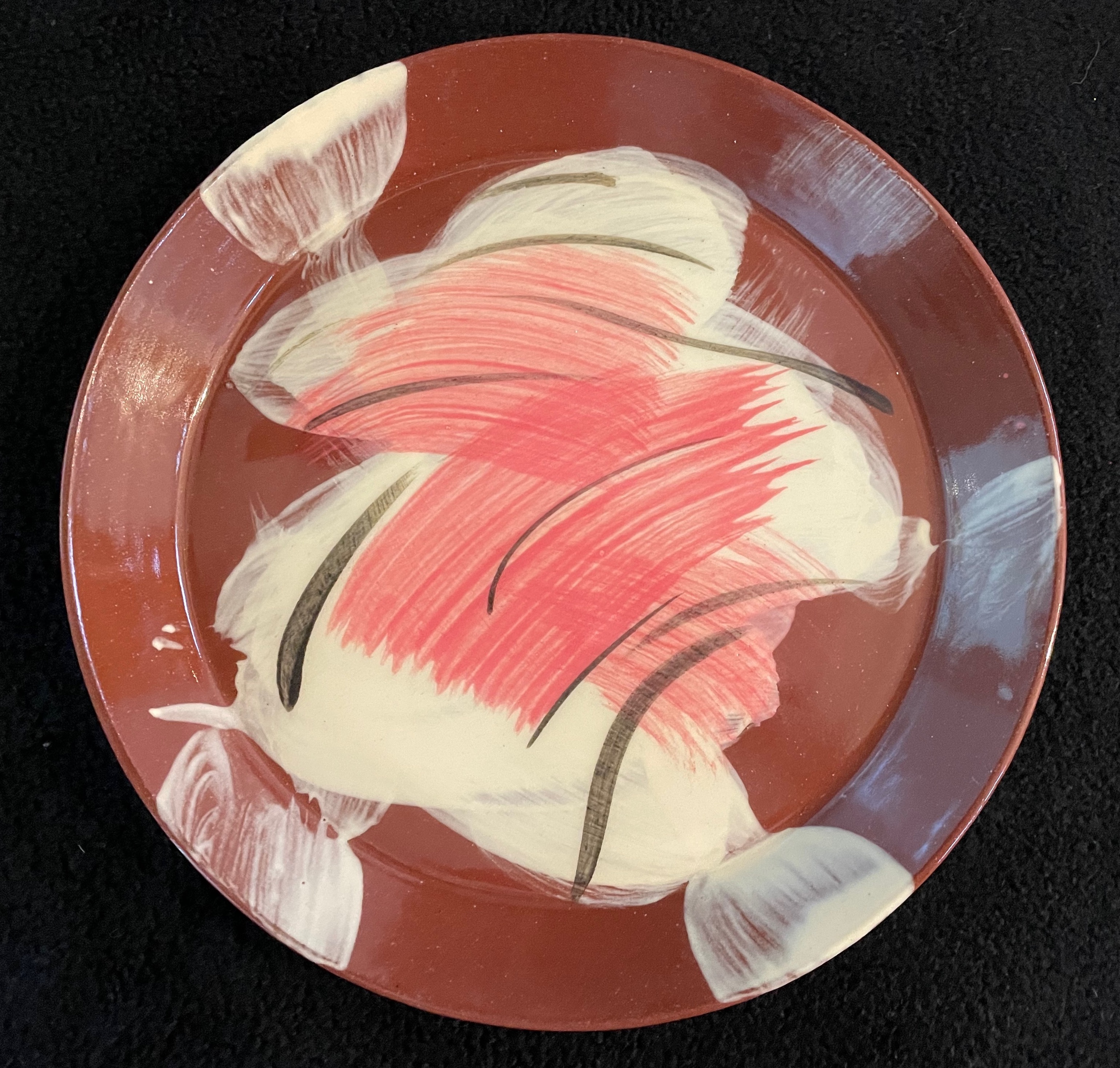Abstractions,  Raspberry Jam
Slip and underglaze decoration, clear top glaze, 
dishwasher safe plates
4.5" to 8.5" Diam $24 to $44