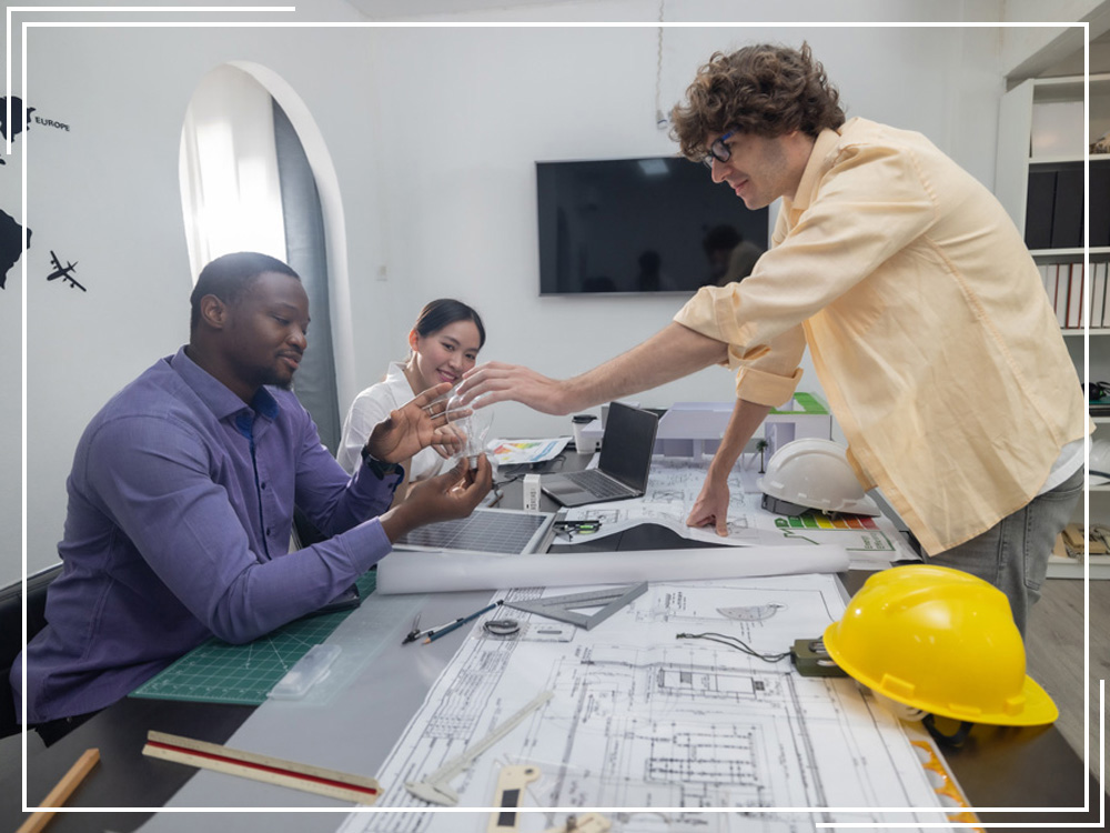 Three people consulting together Three people consulting together