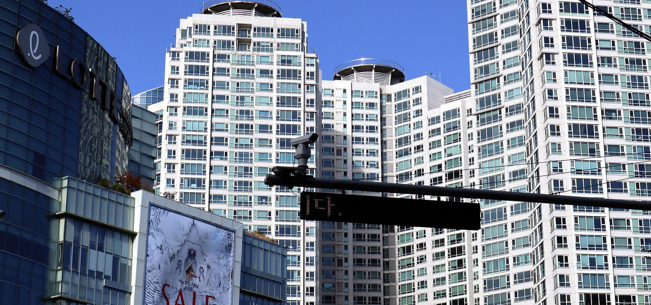 Large building with a sign in the front
