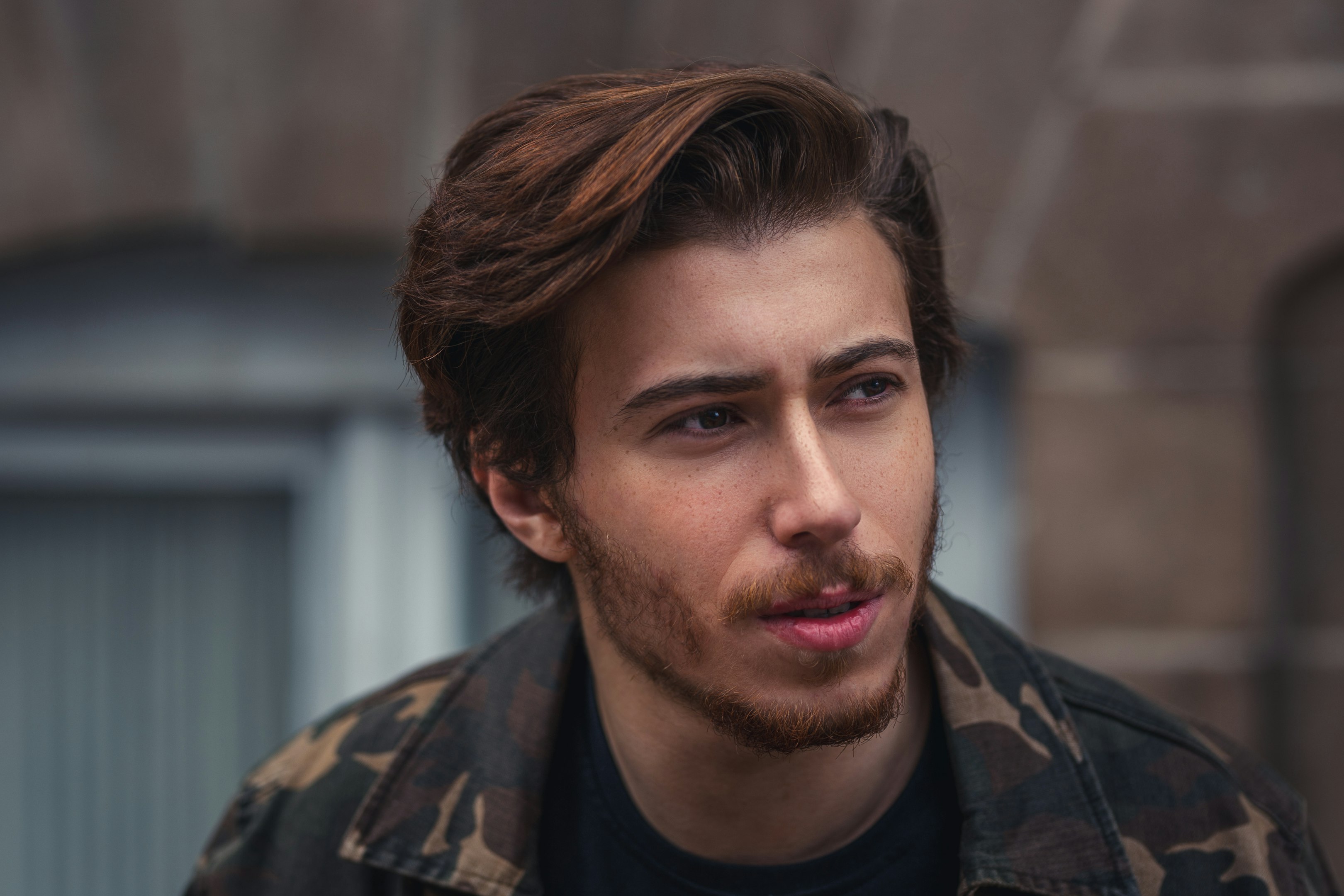 a close up of a person wearing a jacket