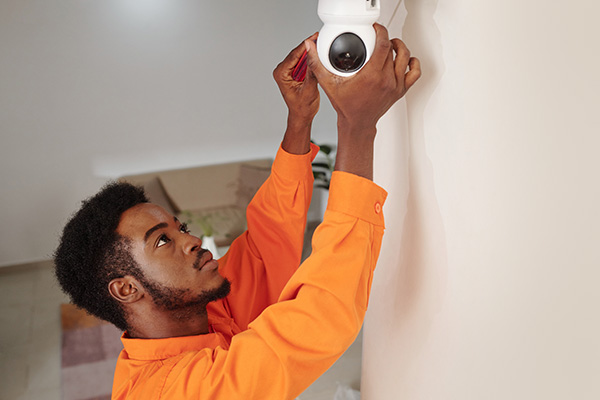 Technician Installing Camera