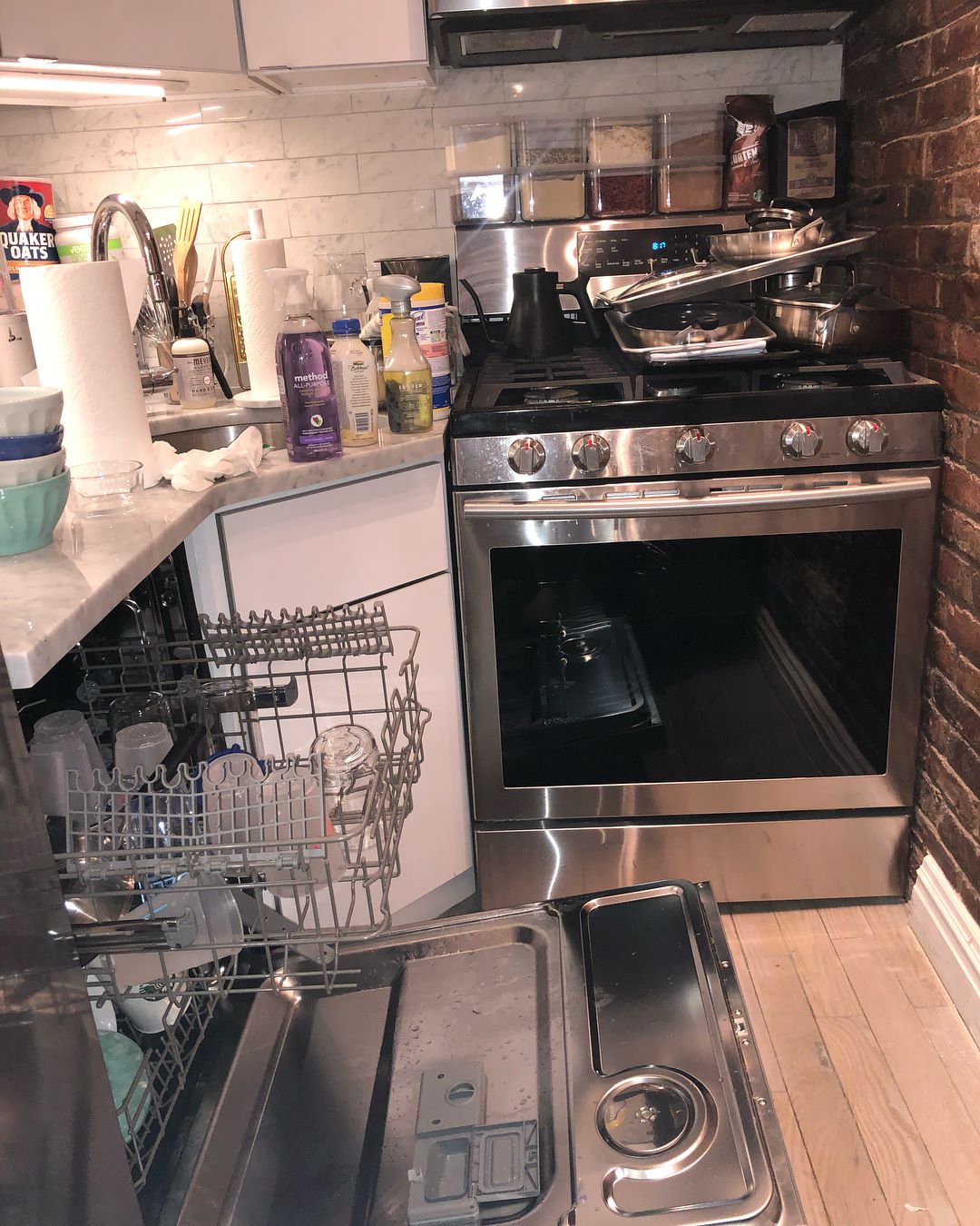 Deep cleaning Toronto – occupied condo kitchen before a Deep Clean Reset with dishes, surface buildup and active use