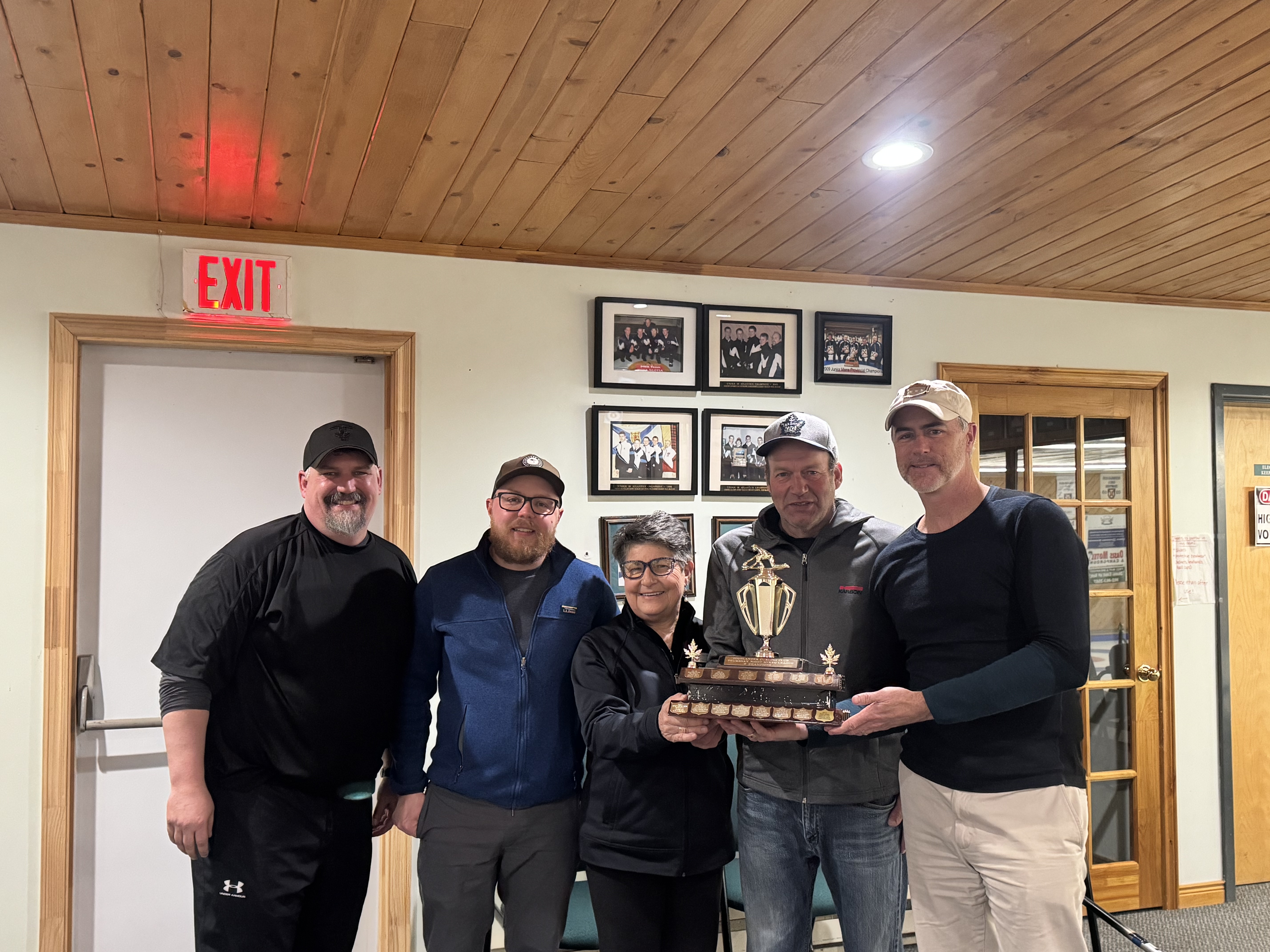 B Division Playoff Champions L-R: Andrew Cameron (lead), Jarrod MacKinnon (second), Leona Williams (mate) and Andre vanderLinden (skip). Presented by Derek Druhan - last year's recipient.