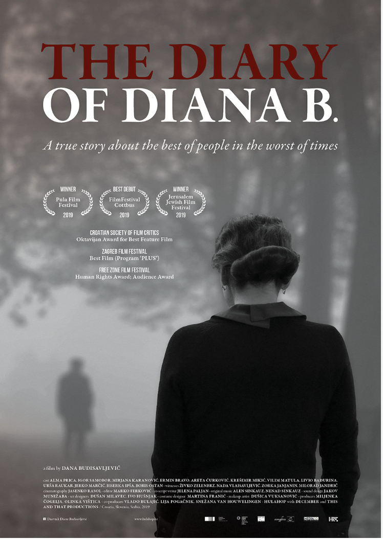 Young woman studying at a wooden desk with books and a potted plant by a window.

