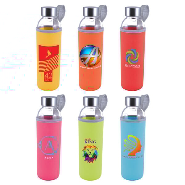 Modern cafe interior with wooden cabinets, hanging lights, four colorful shirts on display, and a barista at the counter.