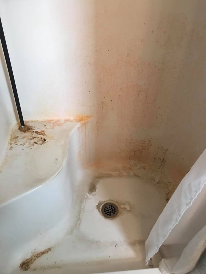 Deep cleaning Toronto – shower before Deep Clean Reset with soap buildup, staining and neglected bathroom surfaces