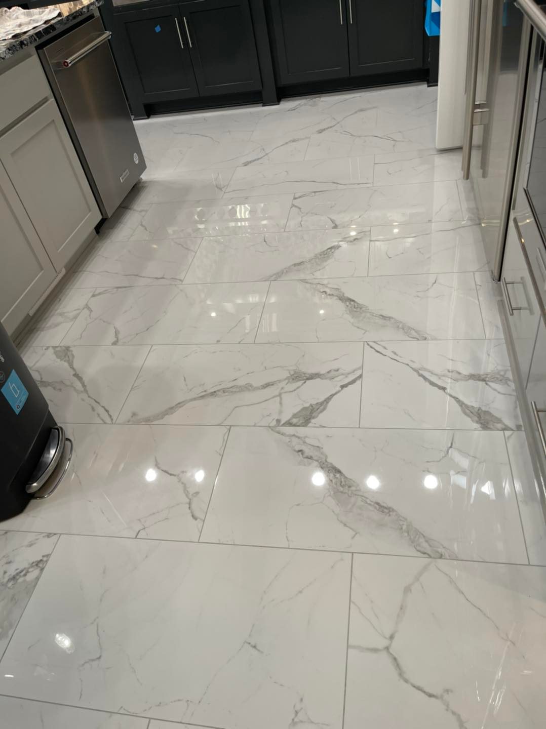 Spotless Marble-Patterned Tile Floor in Modern Kitchen