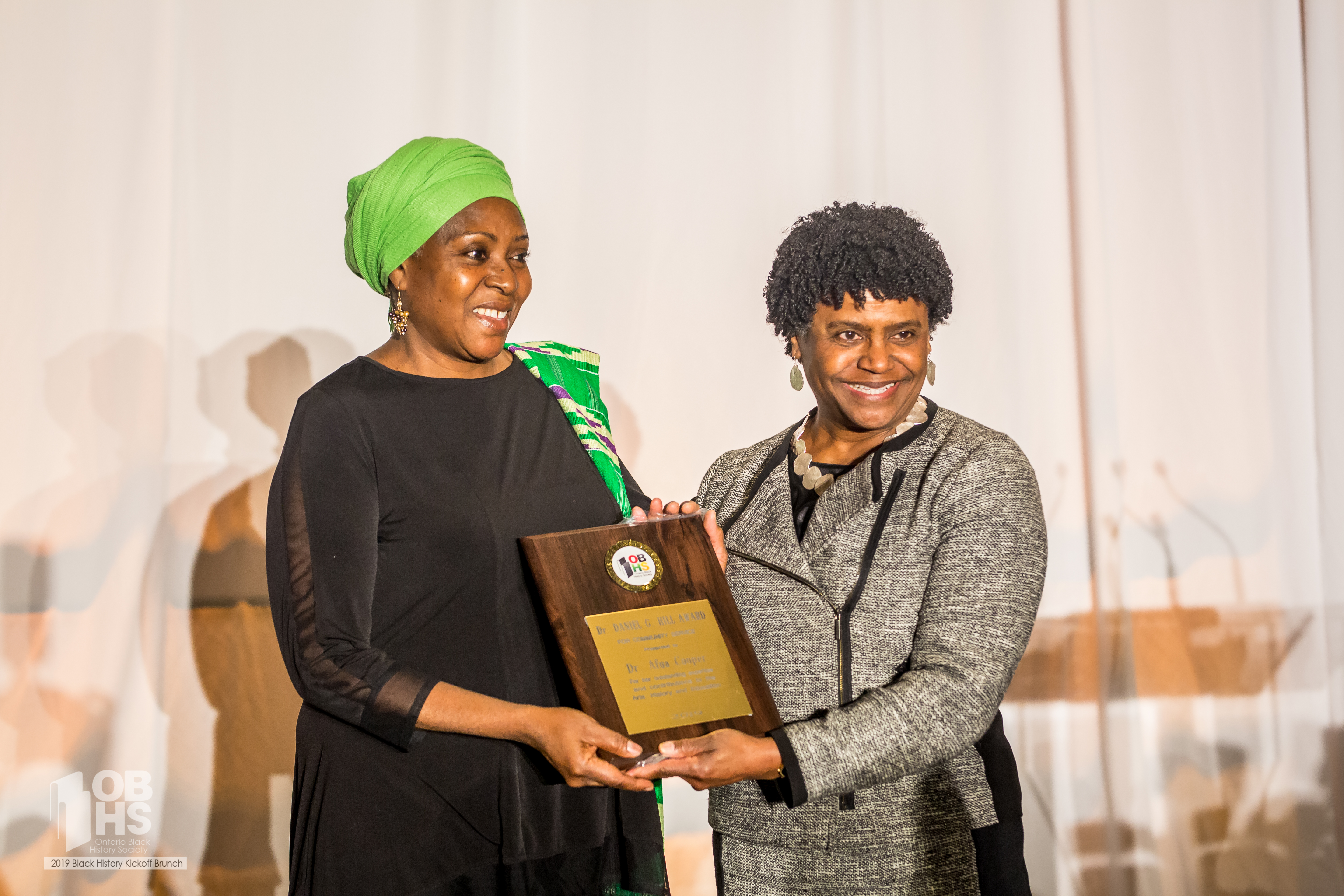 Kim Bernhardt presents an award to Dr. Afua Cooper - photo by www.sayhilondon.com