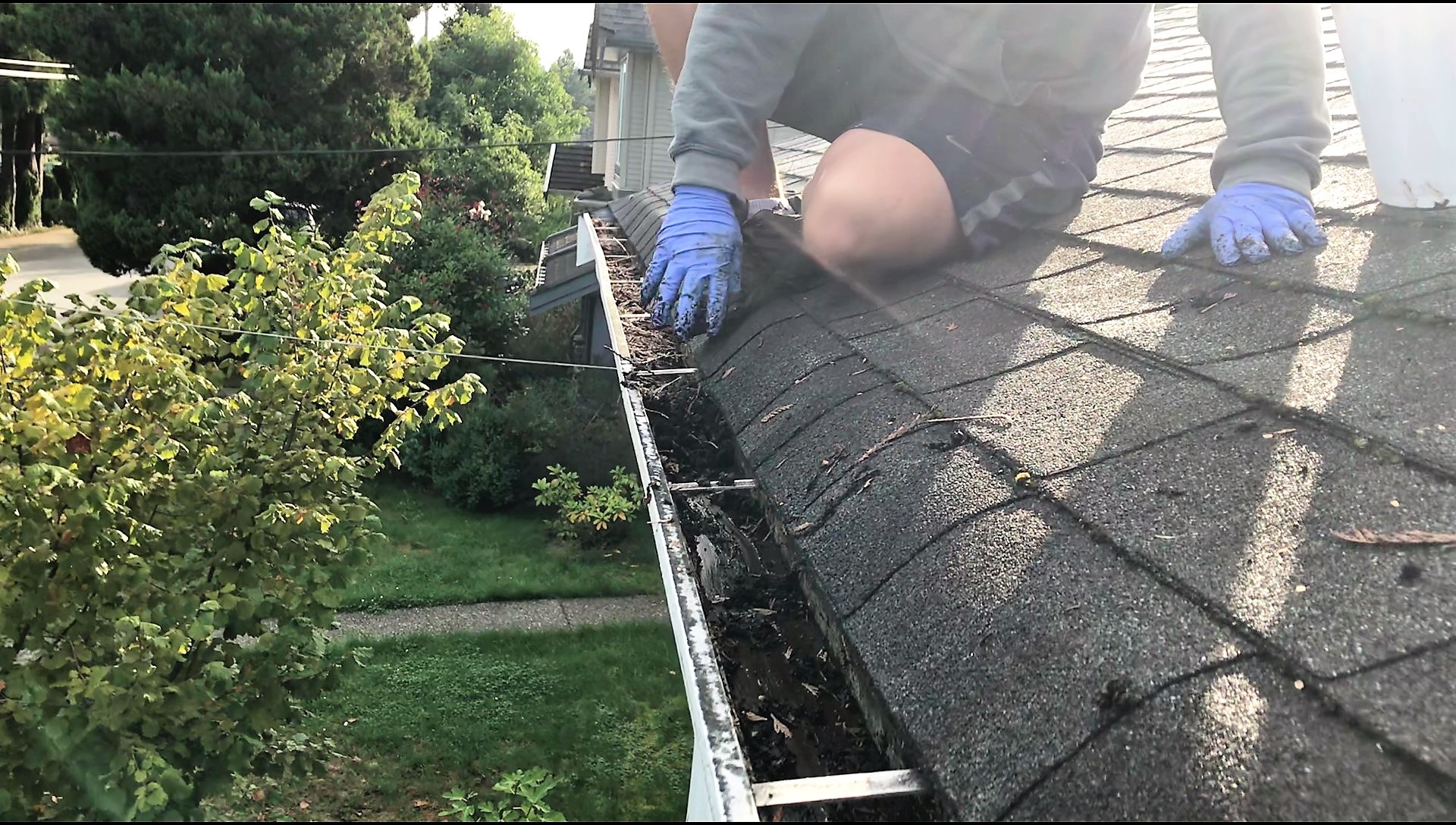 cleaning gutters from the roof line