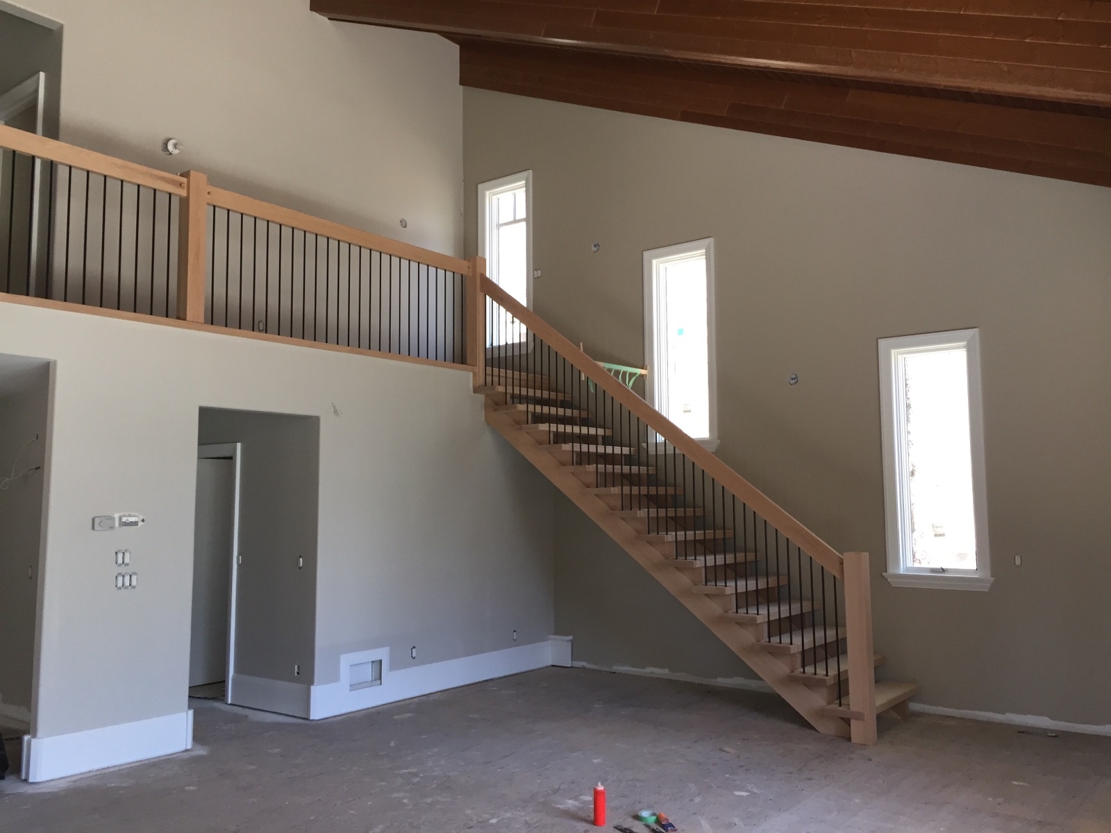 Straight red oak Scandinavian style stairs